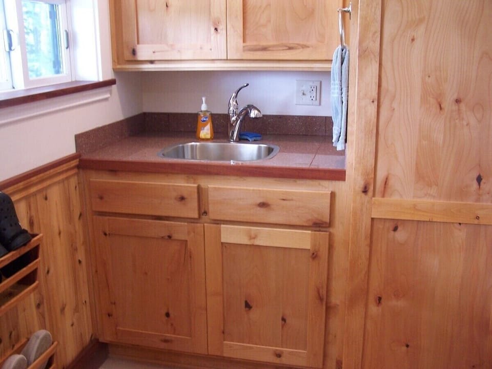 Laundry area for A Rivers View/ Ironing board etc.