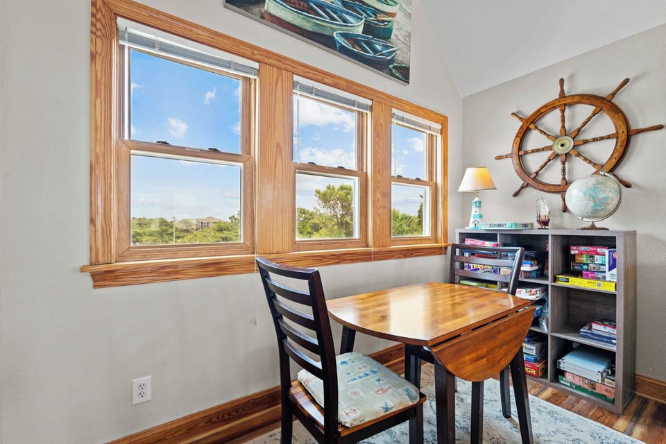 An additional dining area offers seating for two.
