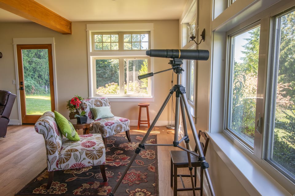 telescope for viewing the Cascade Mountains across the valley