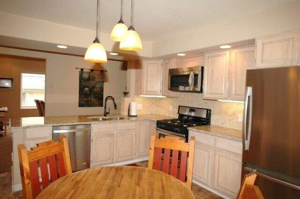 Stainless Steel Appliances; Kitchen stocked w/ pots, pans, plates, glasses, etc
