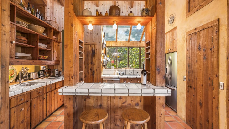 The kitchen bar is a great place for adults or kids to chat with the cooks;