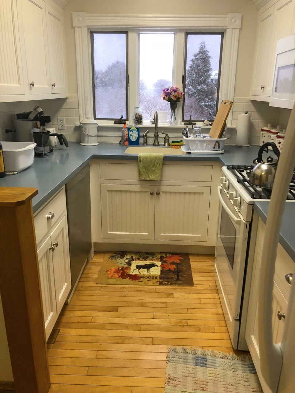 Fully equipped kitchen w/ stove, dishwasher, refrigerator, and pot/pans/coffee