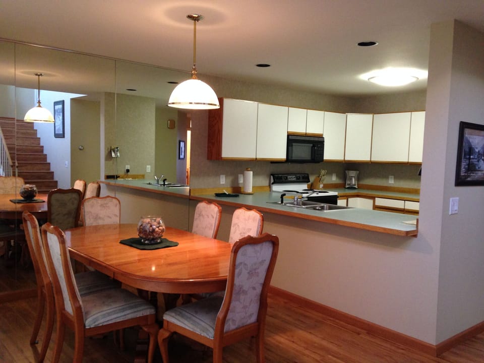 The open floor plan downstairs makes the kitchen and dining areas perfect for entertaining