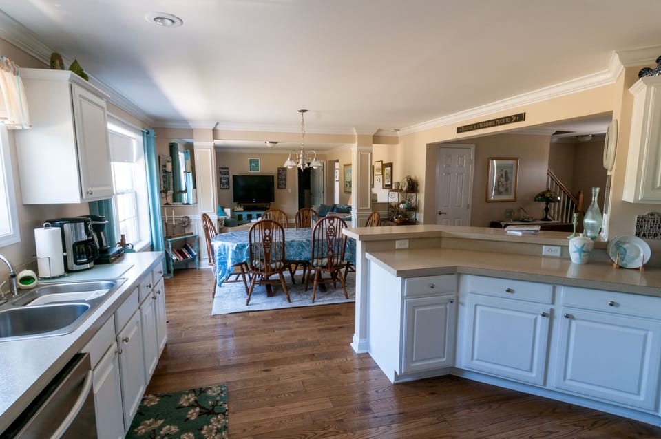 View of Kitchen, Dining Area and Den area