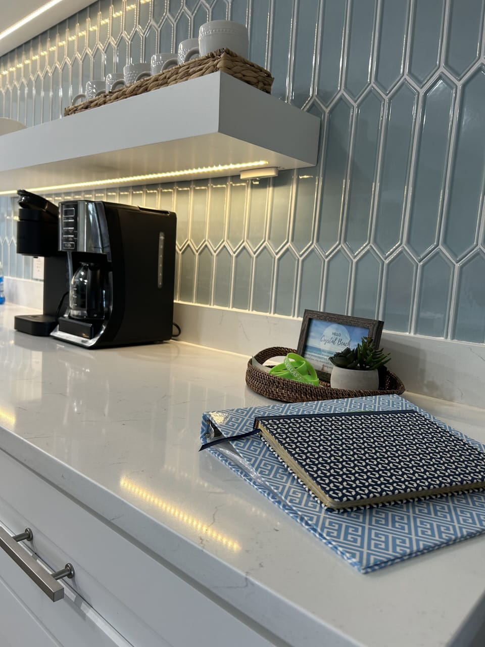 Parking passes, WI-FI information, and the guest book are on the kitchen counter