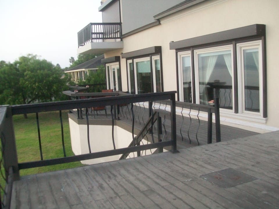Deck and terrace and 1 of the 2 balconies