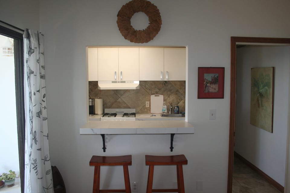 pass-through to kitchen from living room