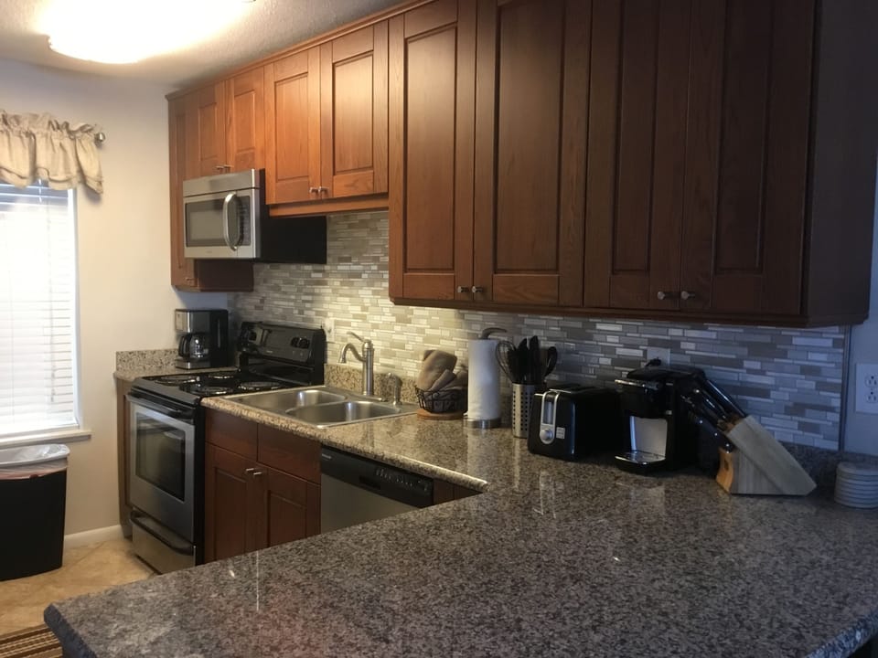 Fully equipped gorgeous kitchen.