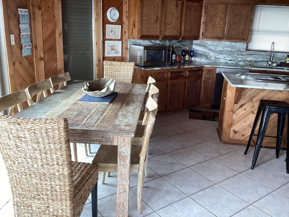 Dining table with seating for 8 with a wonderful view.