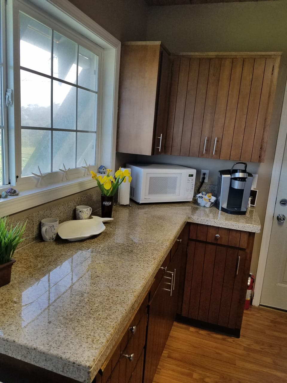 Keurig, microwave, granite countertops