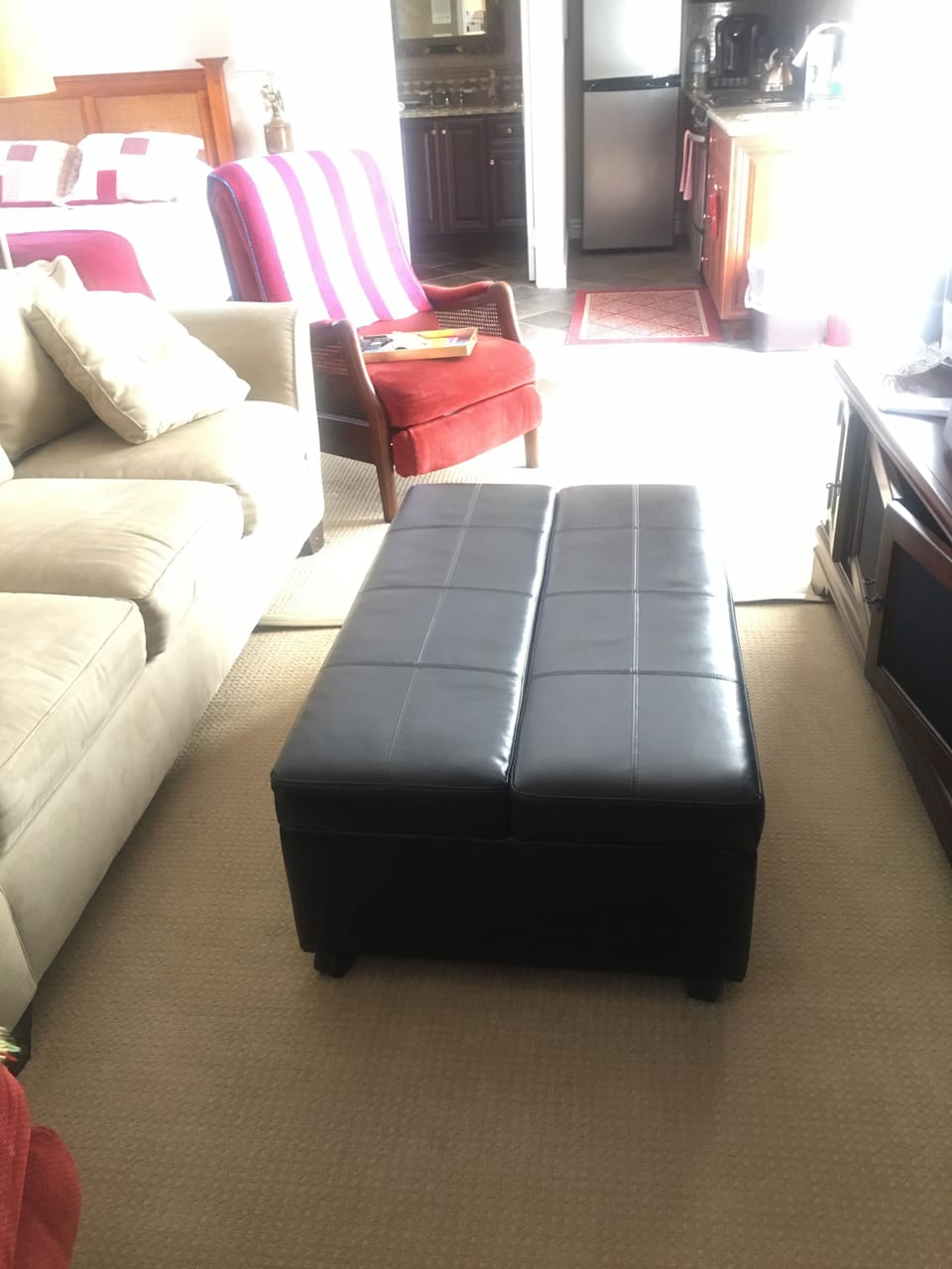 Ottoman folds into a twin bed.