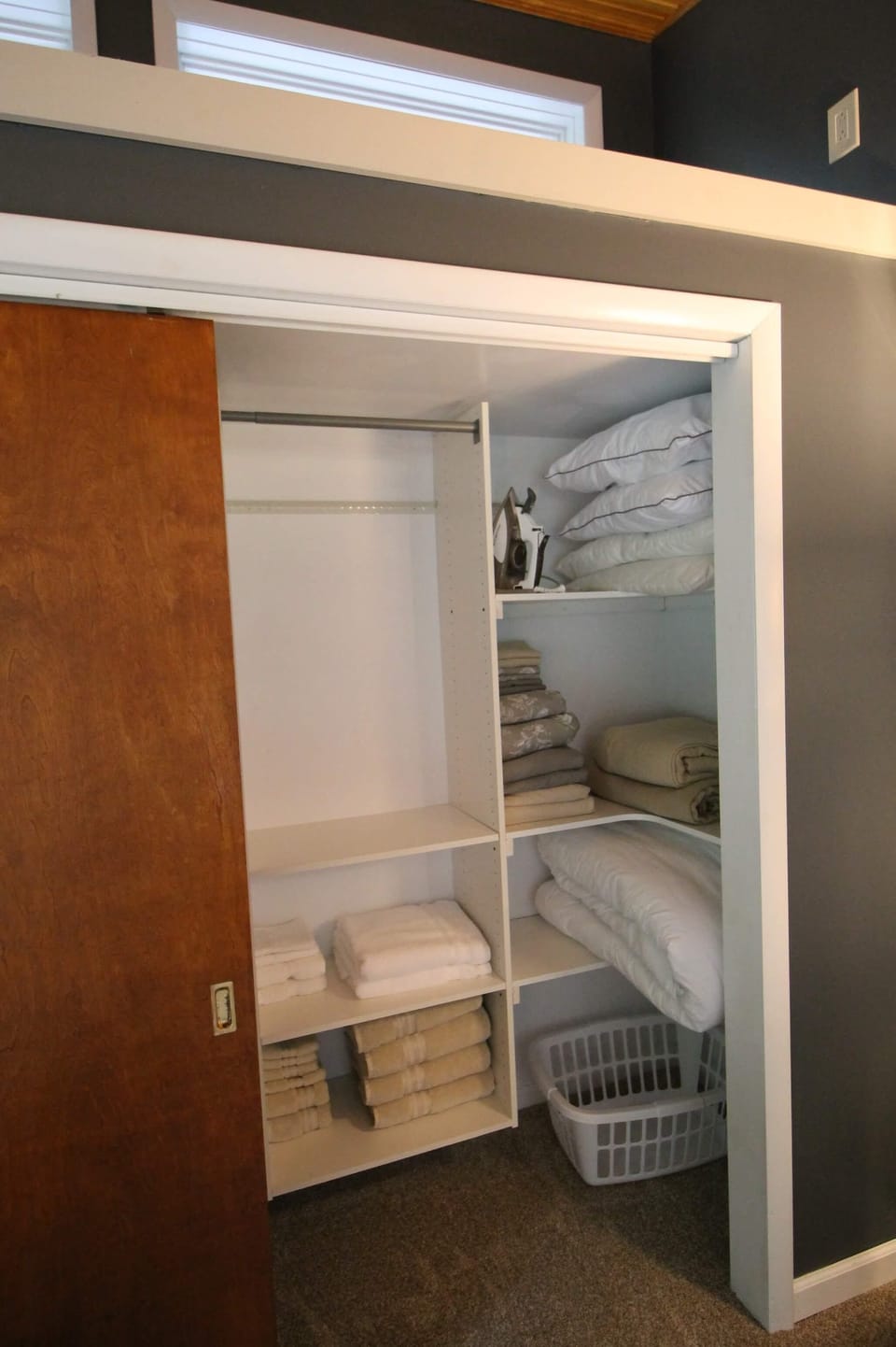 Extra towels, blankets, pillows and linens, iron and travel size ironing board