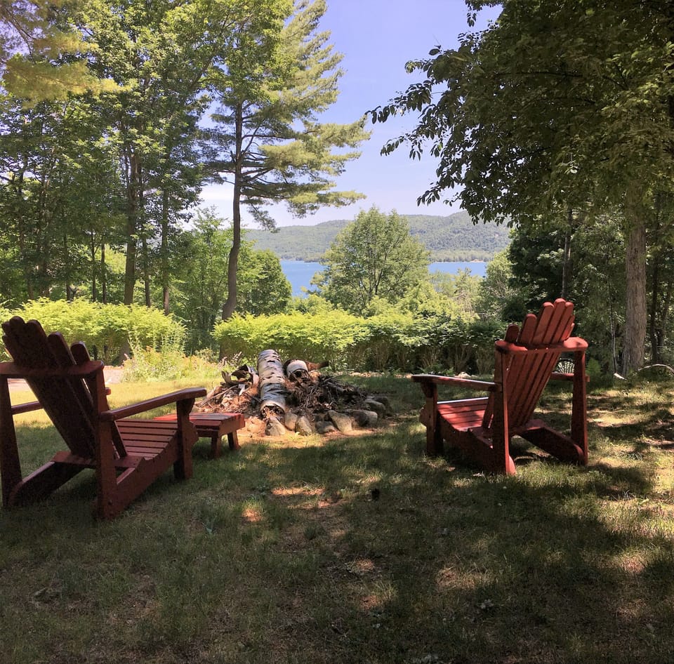 Views of the lake from the front yard fire ring sitting area