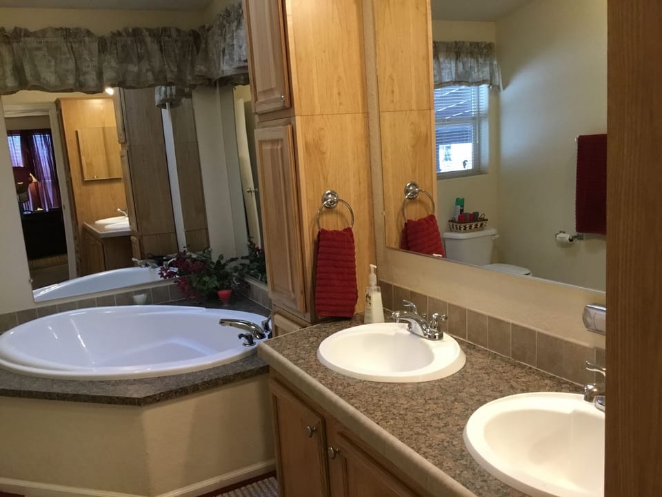 separate shower, bathtub,  walking in closet. double sinks.