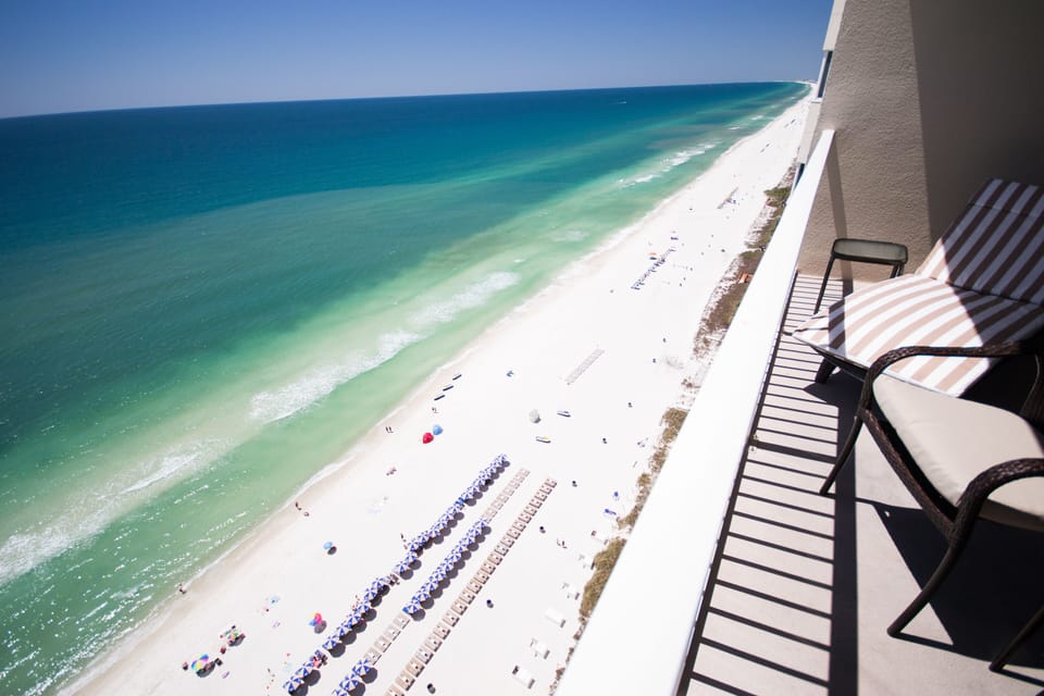 Balcony seating, views off of  LR and MBR,  1 Lounger, 2 chairs, side table