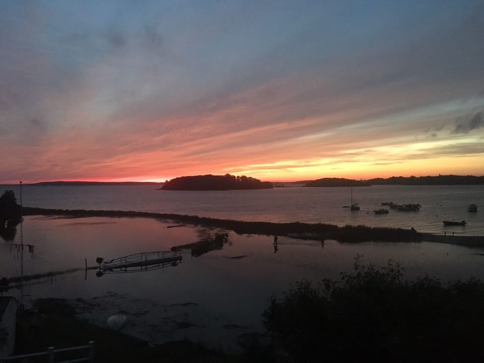 Sunset with high tide at beach