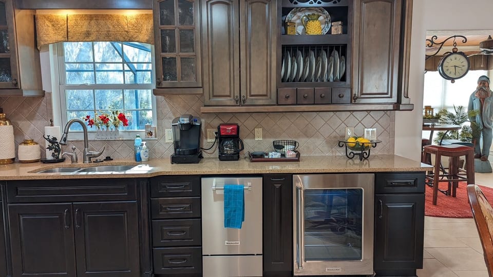 Designer Kitchen with built in drink cooler and commercial ice-maker.