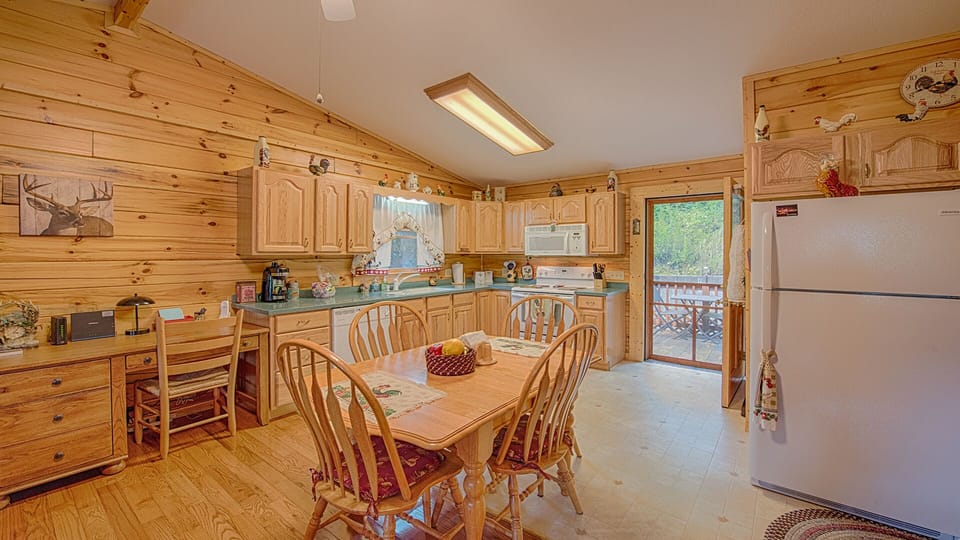 Dining/Kitchen Area with back deck view