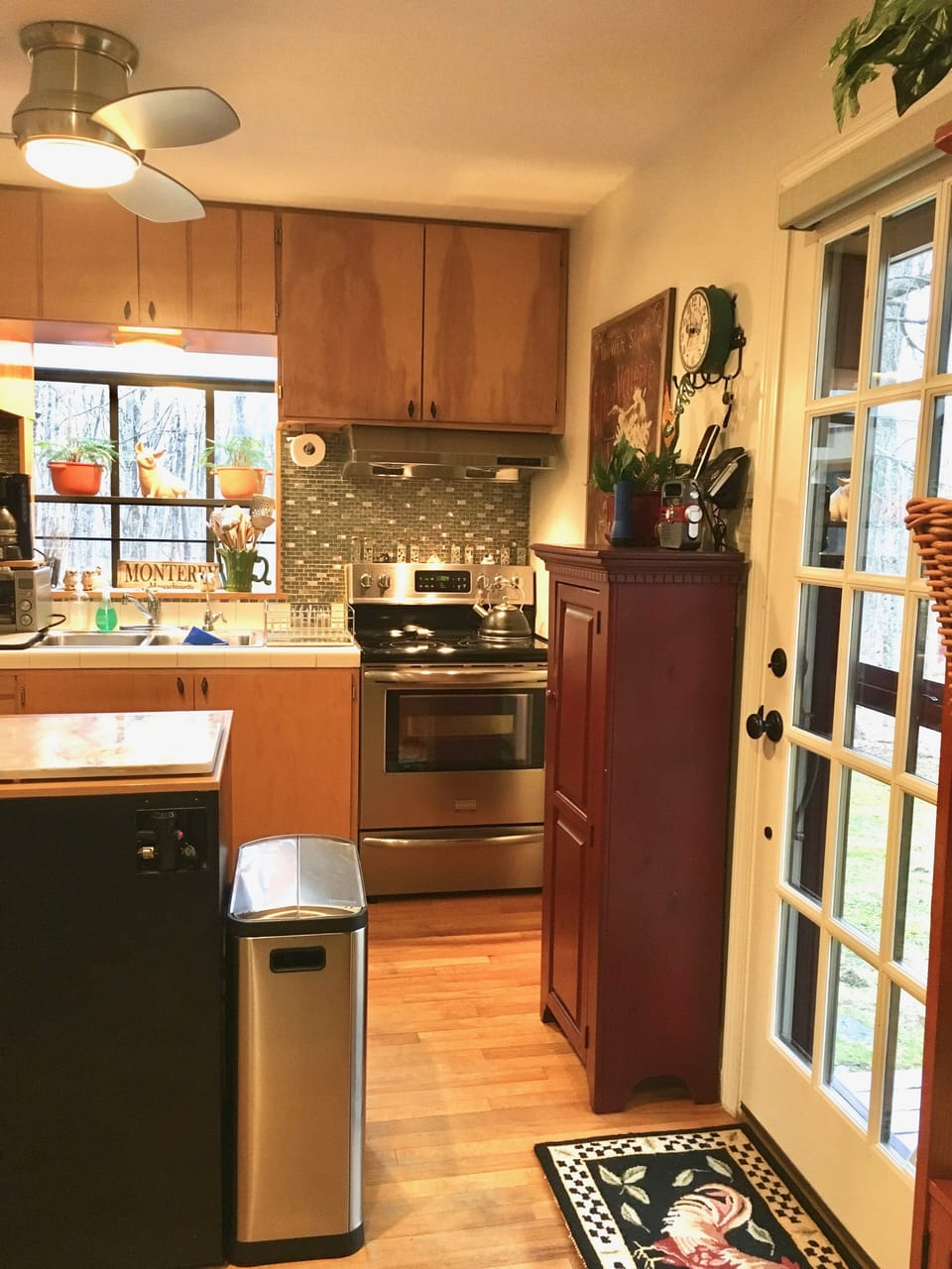 A side door off the kitchen leads out to the side of the house.