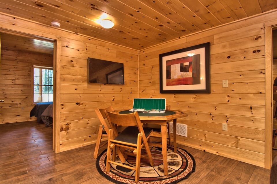 Poker Table Located On The Lower Lever In The Game Room.