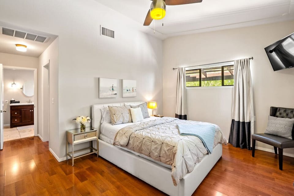 Cozy queen bed with full ensuite for privacy at 1000 Kiler Canyon Road.