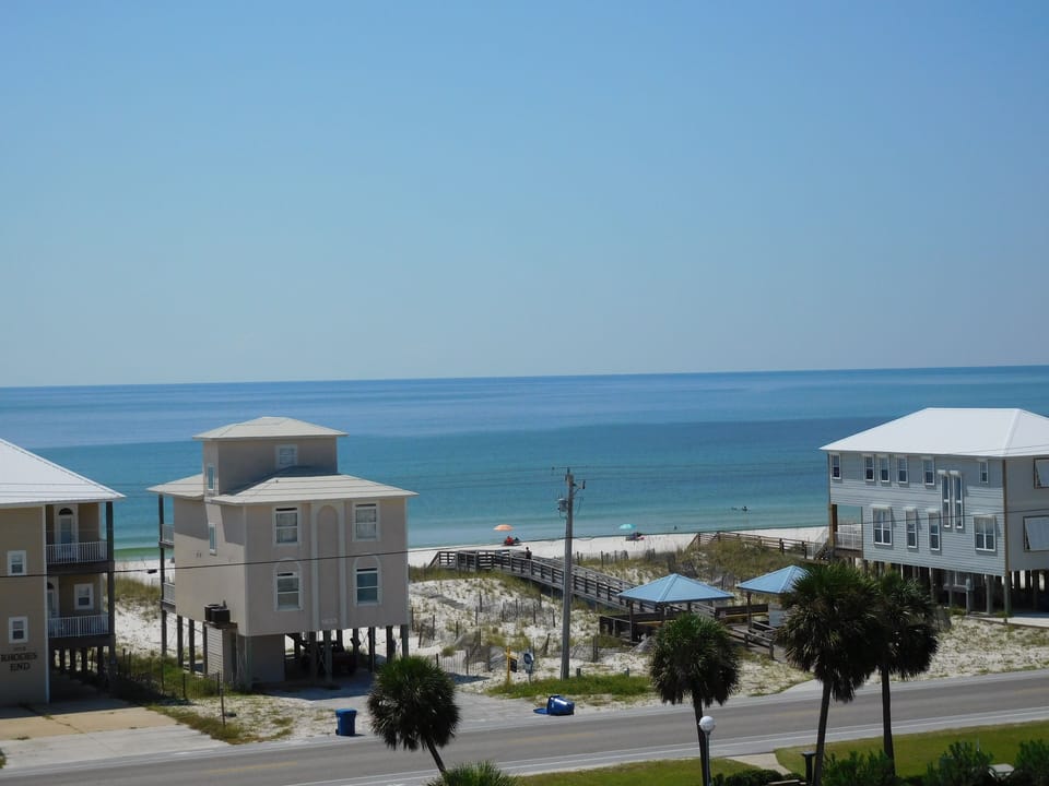 From gulf side balcony. our pavilion and dune walk-over.