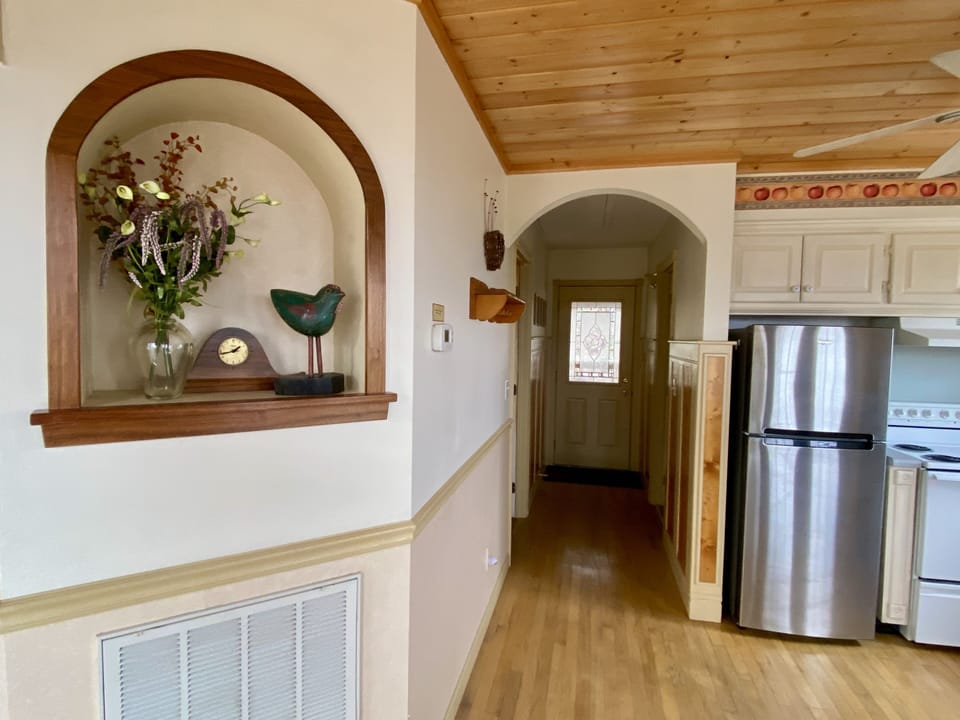 View toward back door leading to porch and hot tub