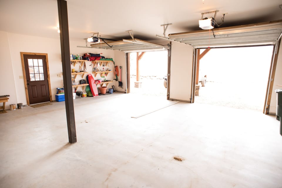 2 car heated garage fits 2 Xcab full sized pickups. 