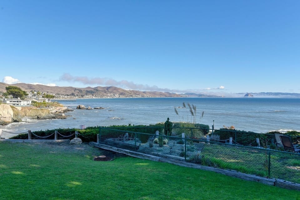 Lawn area off the deck. Guests are only allowed to use yard area immediately in front of this home.