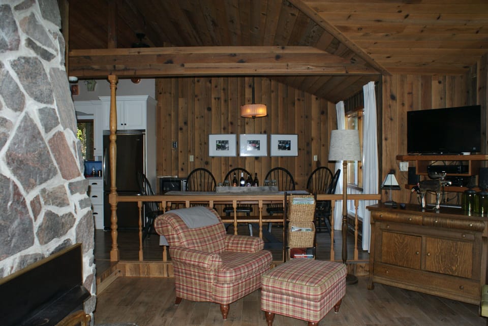 Great room with walkout to deck overlooking the lake