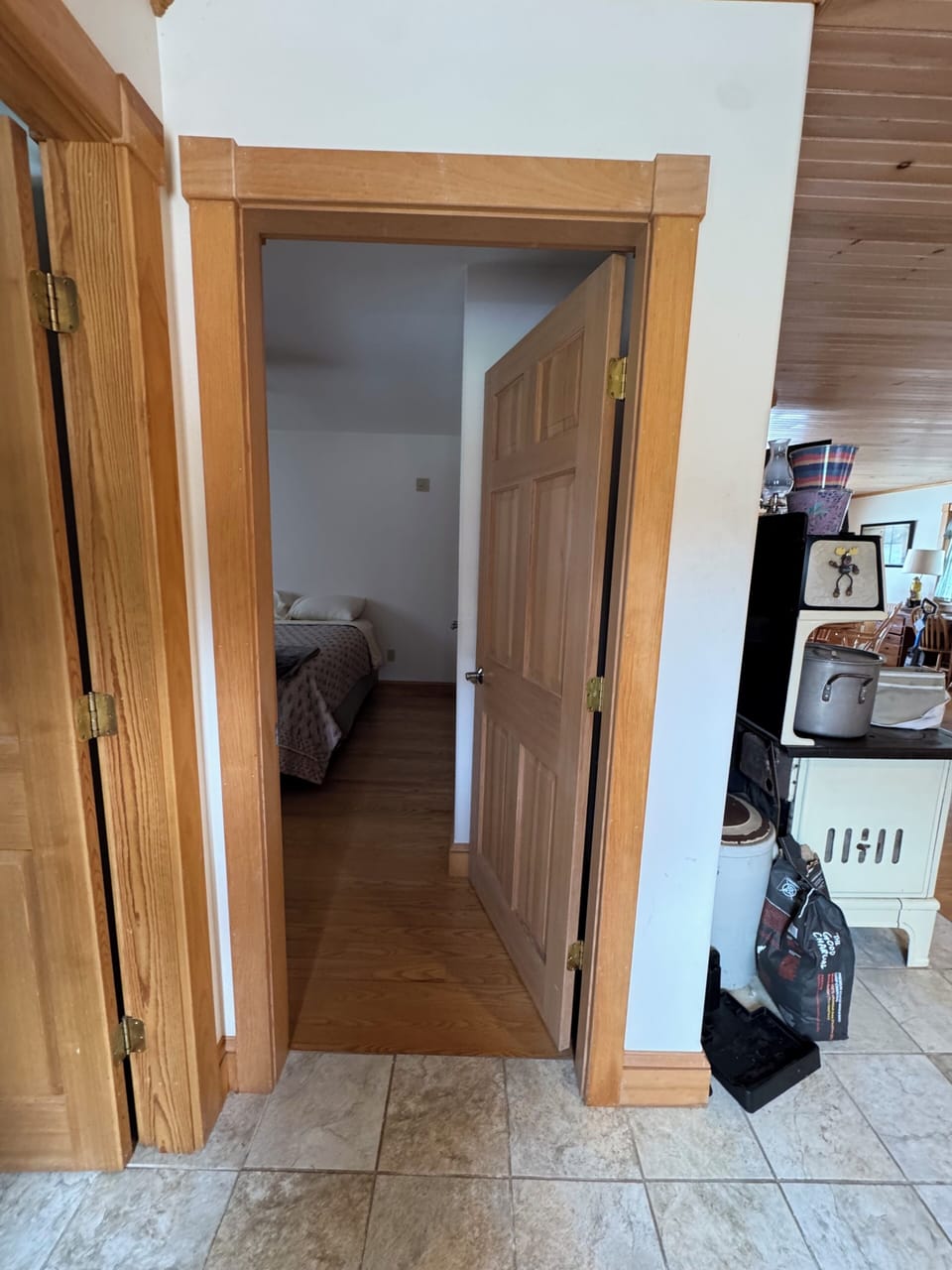 first floor bedroom off of the kitchen and next to the bathroom. 