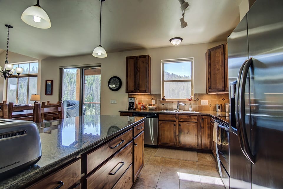 Fully equipped kitchen with stainless steel appliances and granite counter tops!