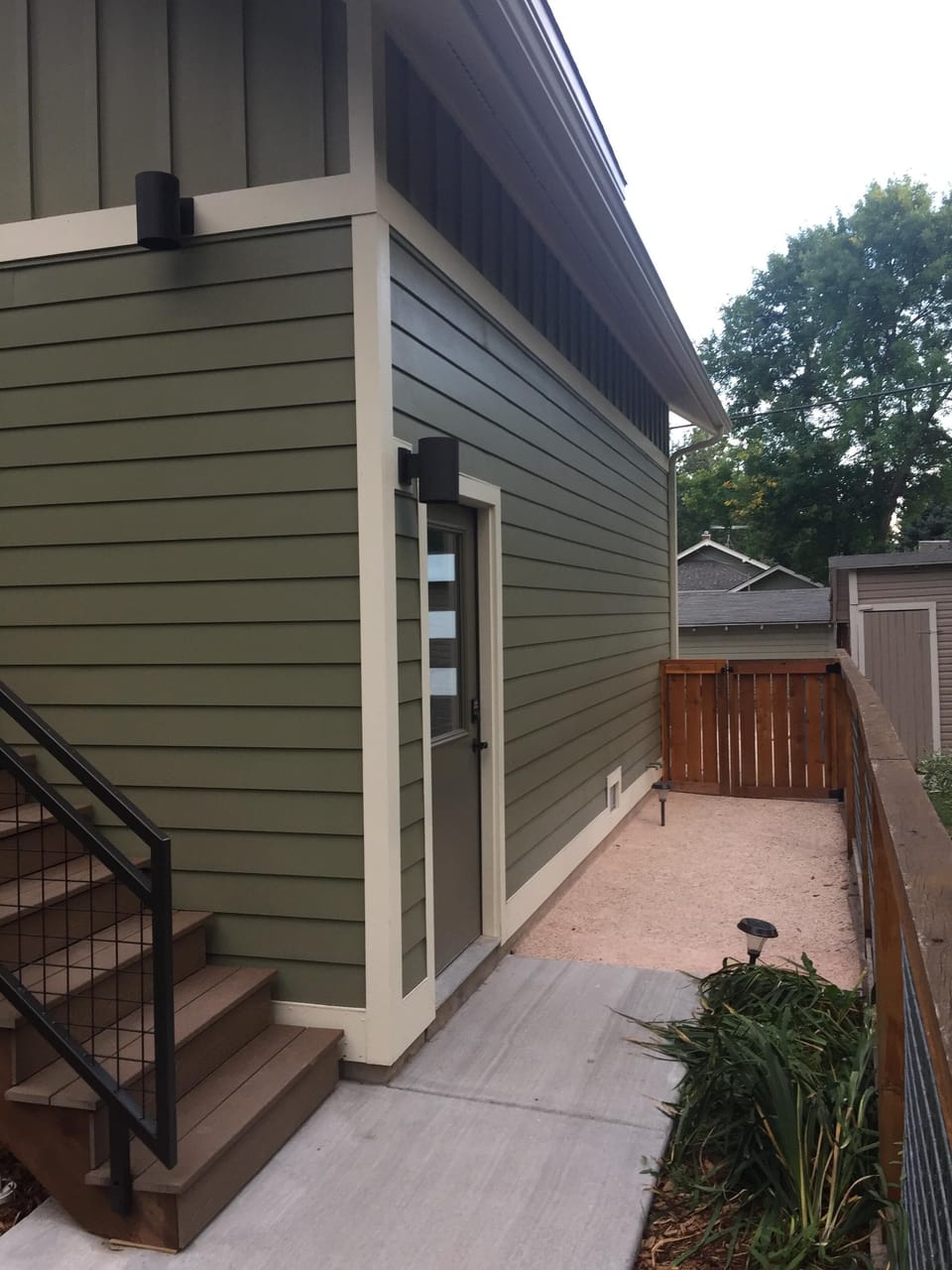 Side access gate and stairs leading up to loft.