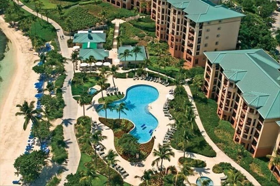 Overview of the Ritz Club area including pools, hot tubs, beach, and Coconut Cove (club side restaurant).