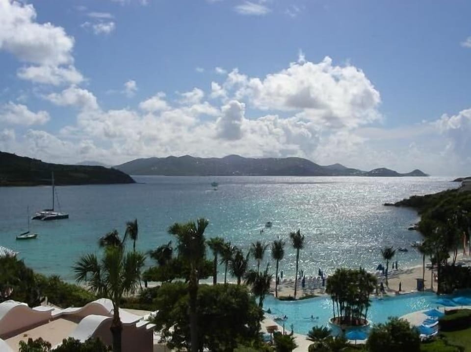 A view of the Ritz Hotel pool, beach and view.