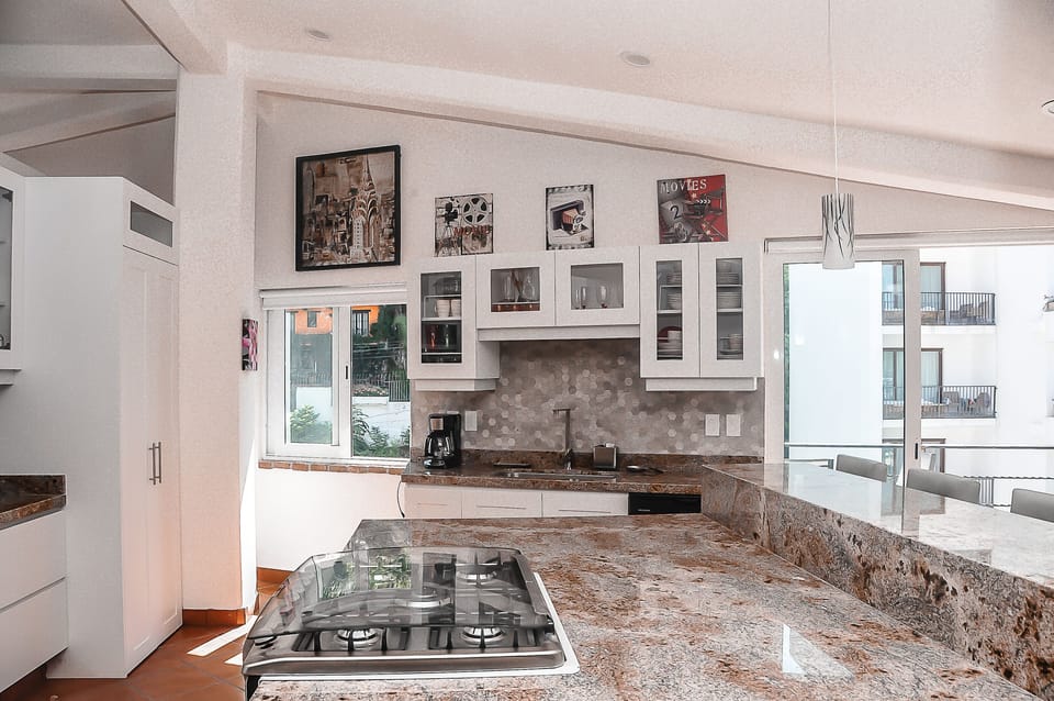 Huge marble center island  with stove, spacious counters,  overlooking Ocean, 