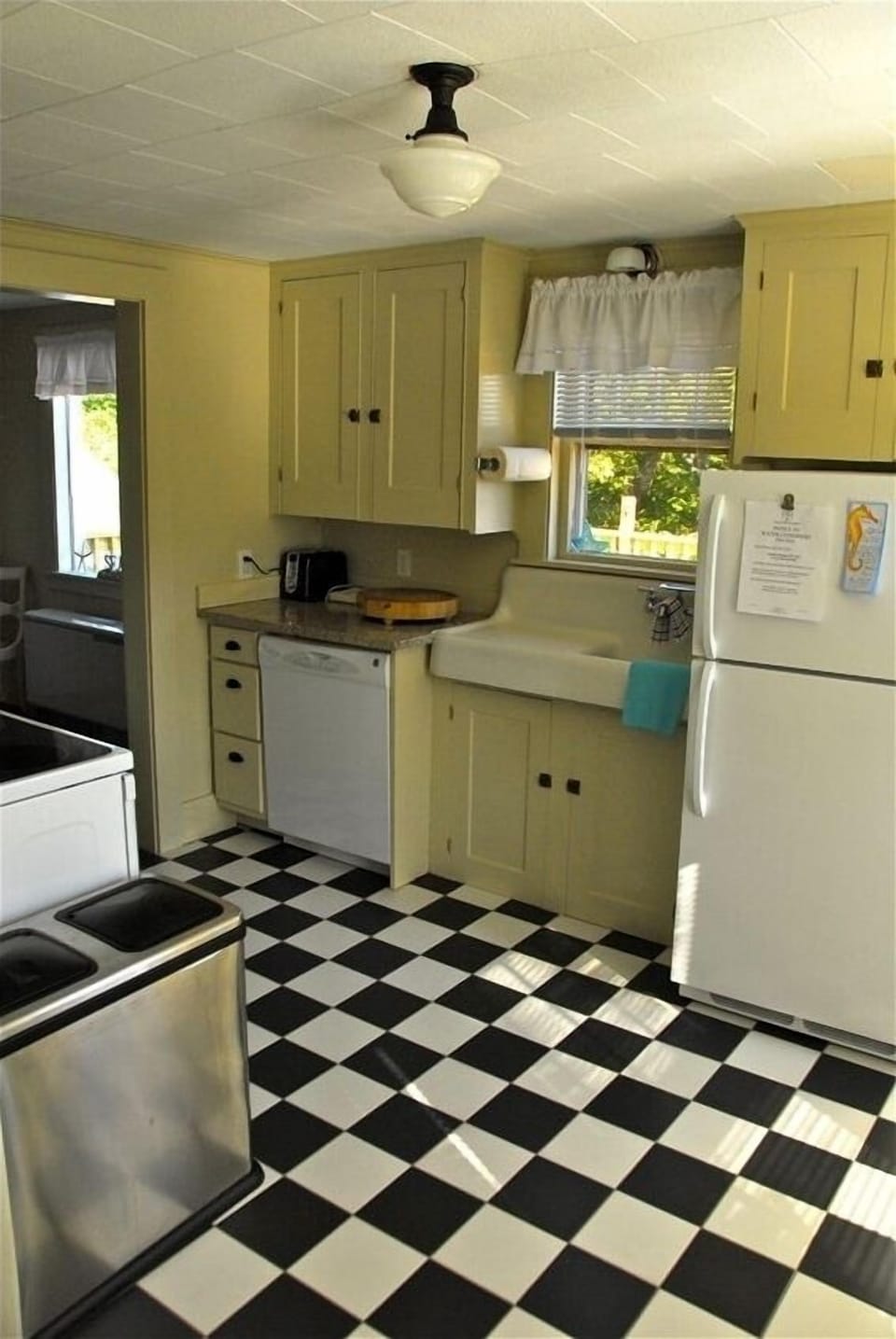 Fully appointed 1920's kitchen includes a dishwasher.