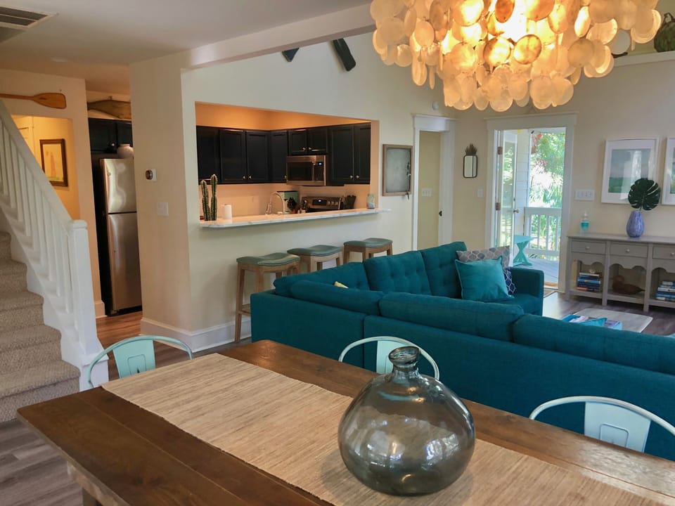 View from the dining room of the kitchen and front door