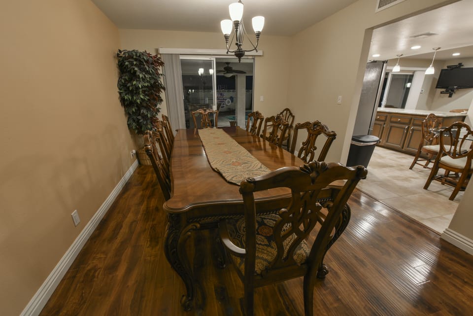 Dining Room seating 8 with beautiful hardwood table and chairs