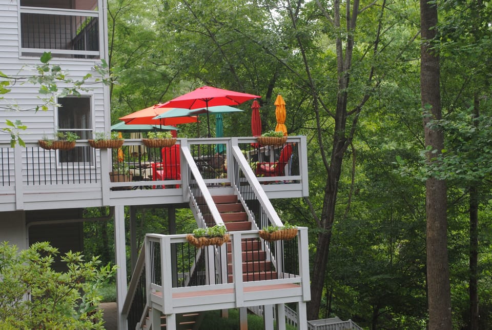 gated deck overlooking the lake-- two tables seating 4-6 each, chaise lounges! 