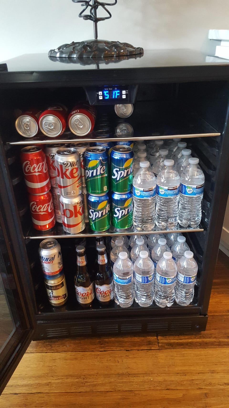 Fully stocked beverage cooler for every guest