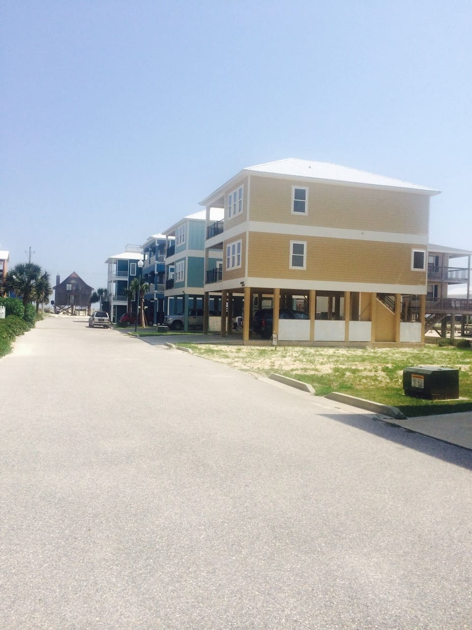 House from the outside, walking back from pool. 