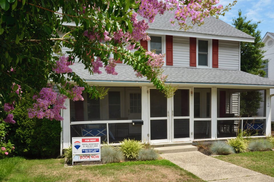 With its charming front porches from yesteryears, you will enjoy just sitting and watching the people stroll by!