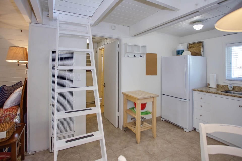 The loft bedroom is accessed by a steep ladder, and is strictly off-limits to young children due to the exposed opening at the top. Parents must use their discretion when considering this accommodation.
                