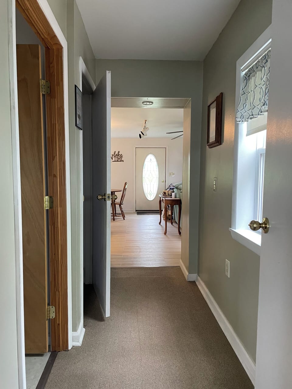 Hall view from back bedroom to front door 