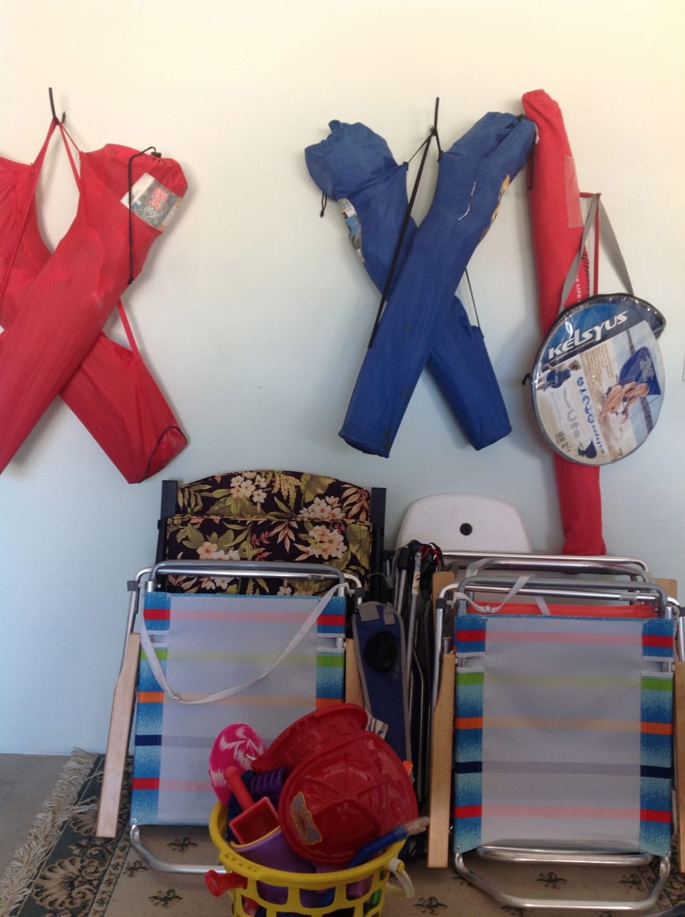 Assorted beach chairs, loungers, umbrellas, toys are available for use