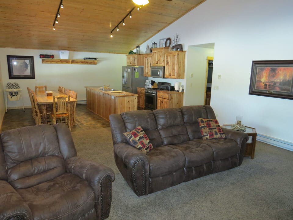 The comfy leather furniture will help you get into "vacation de-stress mode."