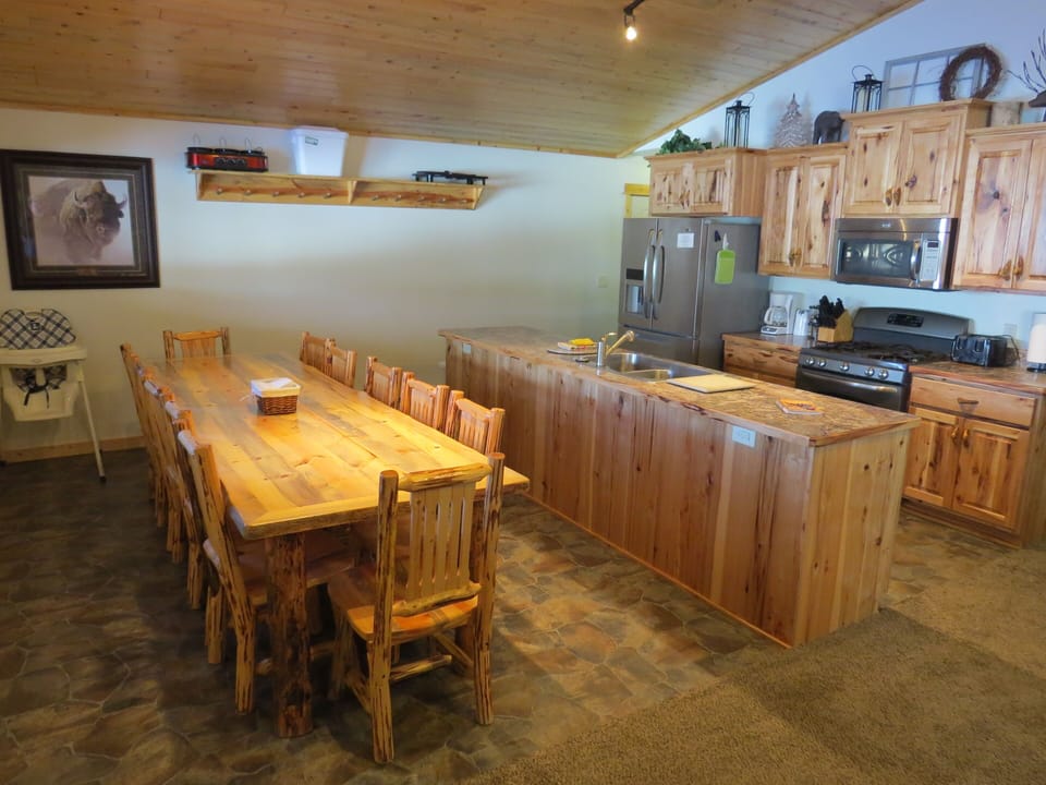 Enjoy sharing meals & exciting vacation experiences at the large dining table.