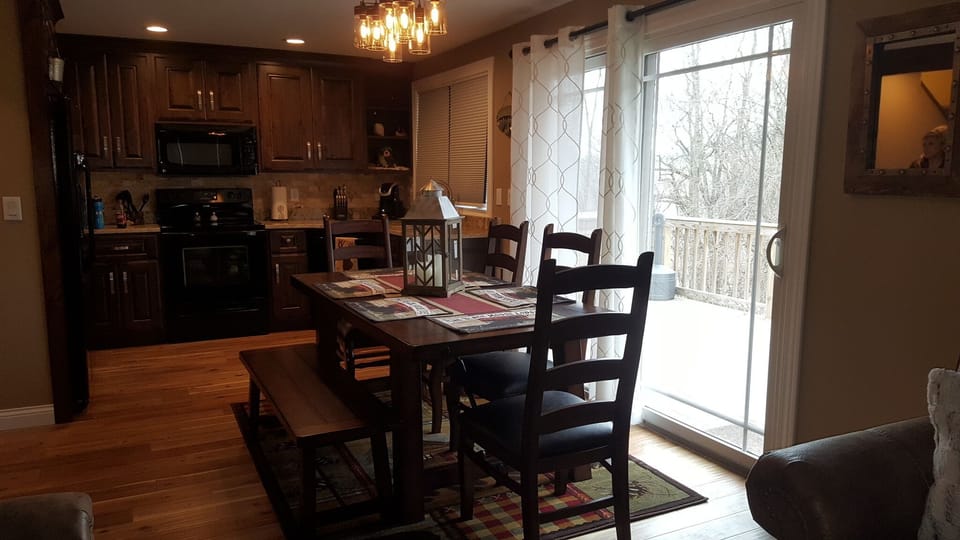 Dining Room, Table Seats 6, New Knotty Alder Kitchen Cabinets. 