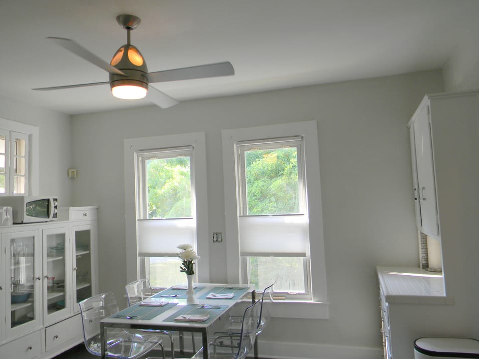 Quiet, modern ceiling fans in kitchen, hallway, both bedrooms, and living room.